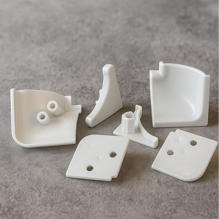 фото Комплект заглушек для вогнутого плинтуса ,белый (к алюм. и пласт.плинтусу)